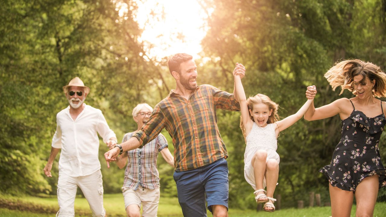 Multigenerational family enjoying time outdoors, representing changing Southwest Florida real estate trends