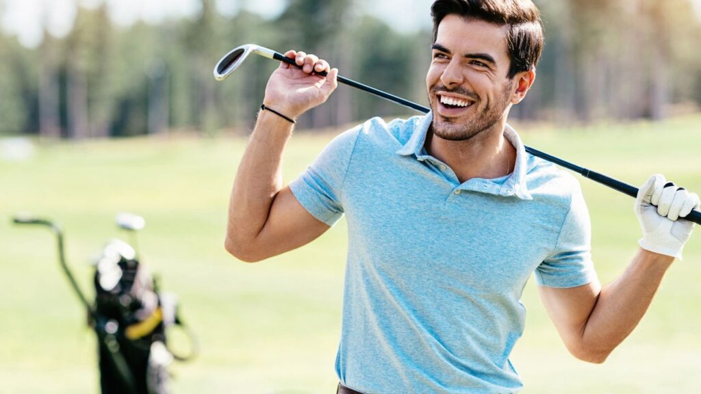 Smiling golfer enjoying a sunny day at a golf community in Southwest Florida