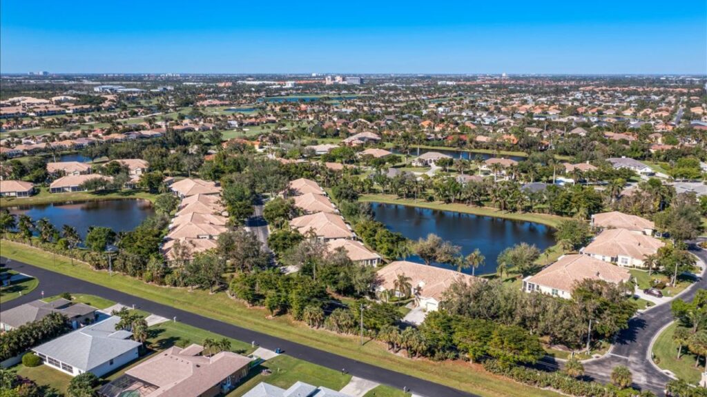 Aerial of Sommerset lakefront villas at Lexington Country Club in South Fort Myers.