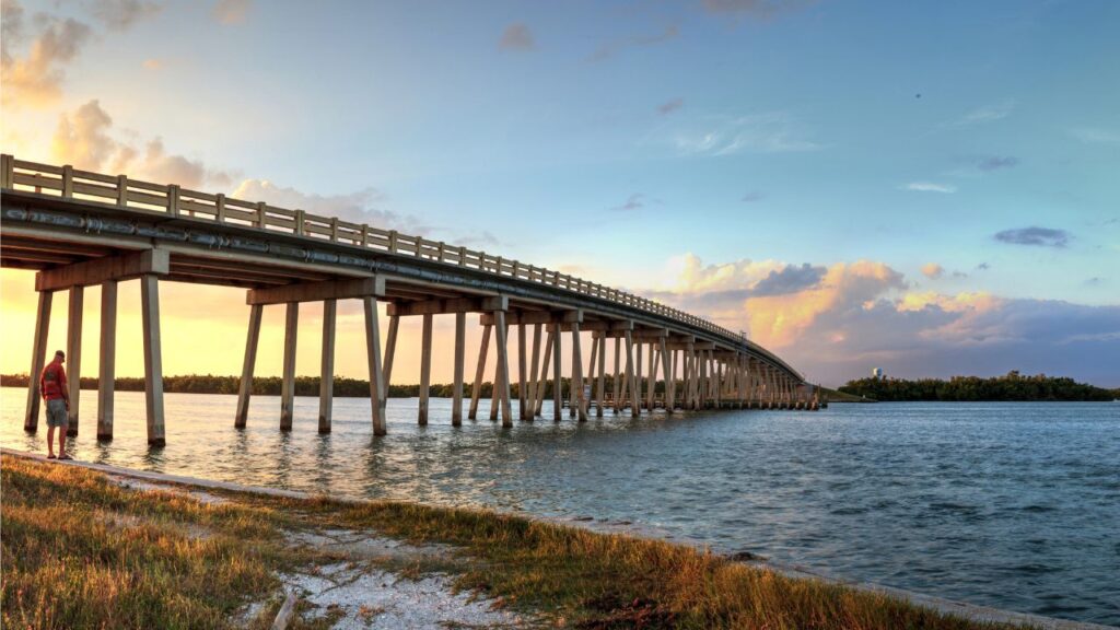 Sunset over the bridge along Estero Boulevard crossing New Pass from Estero Bay in Bonita Springs