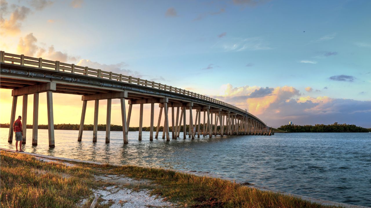 Sunset over the bridge along Estero Boulevard crossing New Pass from Estero Bay in Bonita Springs