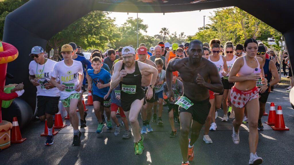 Runners starting the CincoRita Run in Fort Myers 2025, an annual community race at Bell Tower