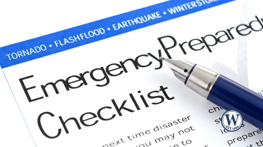 Close-up of an emergency preparedness checklist and pen used to finalize hurricane plans 72 hours before landfall in Southwest Florida.