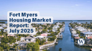 Aerial view of Fort Myers waterfront homes and canals under a clear blue sky, featured image for Worthington Realty’s July 2025 Housing Market Report.