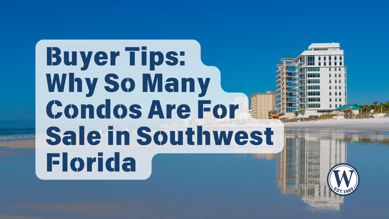 High-rise condos along the Southwest Florida coast with clear blue skies and calm Gulf waters