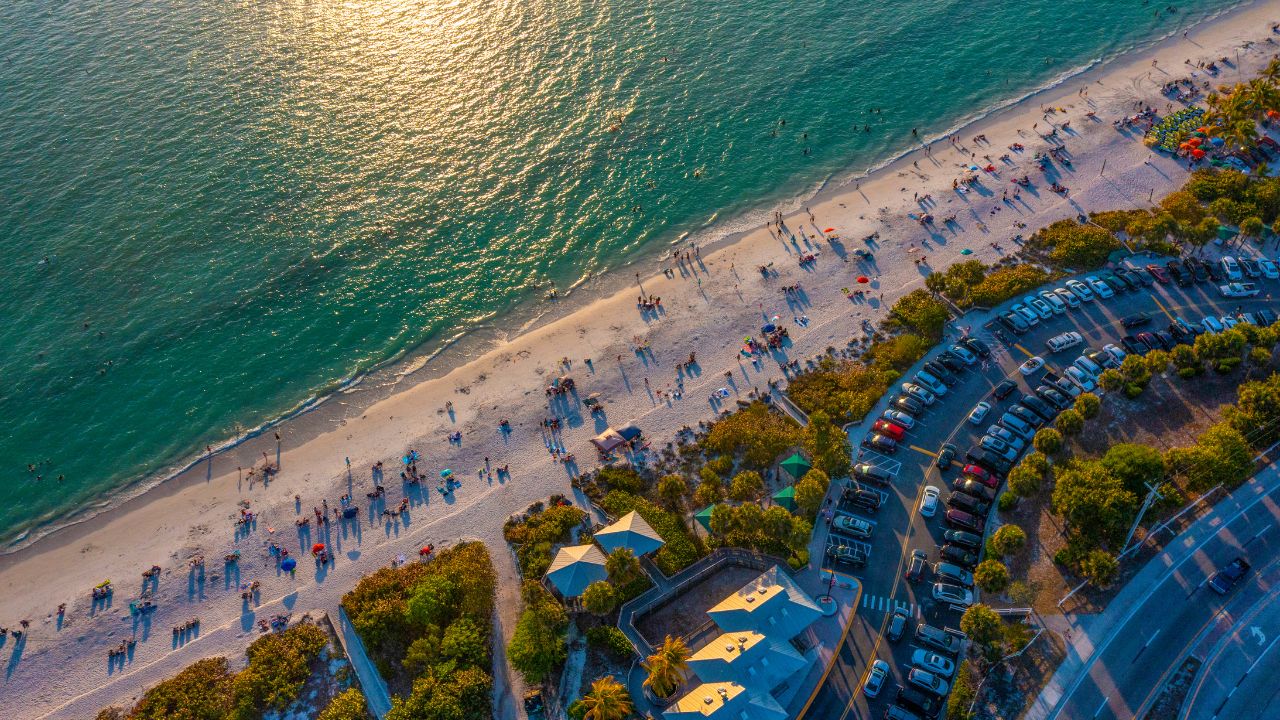 Waterfront homes and boats along the shoreline in Bonita Springs during daylight, representing the Bonita Springs market update