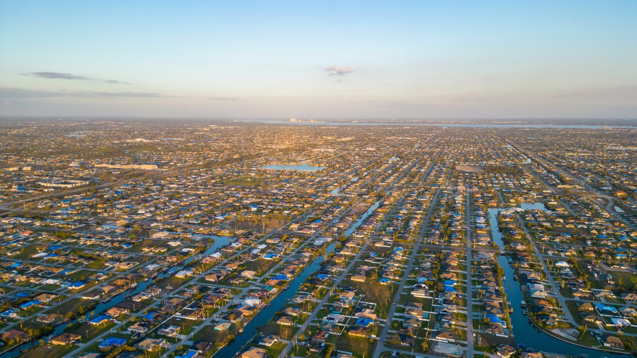 Aerial view of waterfront homes and canals in Cape Coral, representing the Cape Coral market update
