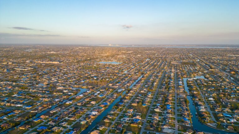 Aerial view of waterfront homes and canals in Cape Coral, representing the Cape Coral real estate market update