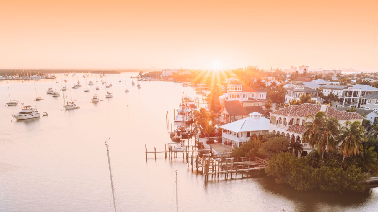Aerial view of Fort Myers Beach waterfront and marina during daylight, representing the Fort Myers market update