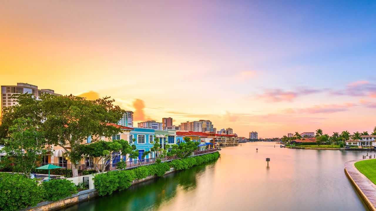 Waterfront homes and high-rise condos at sunset in Southwest Florida, representing the Southwest Florida real estate market update