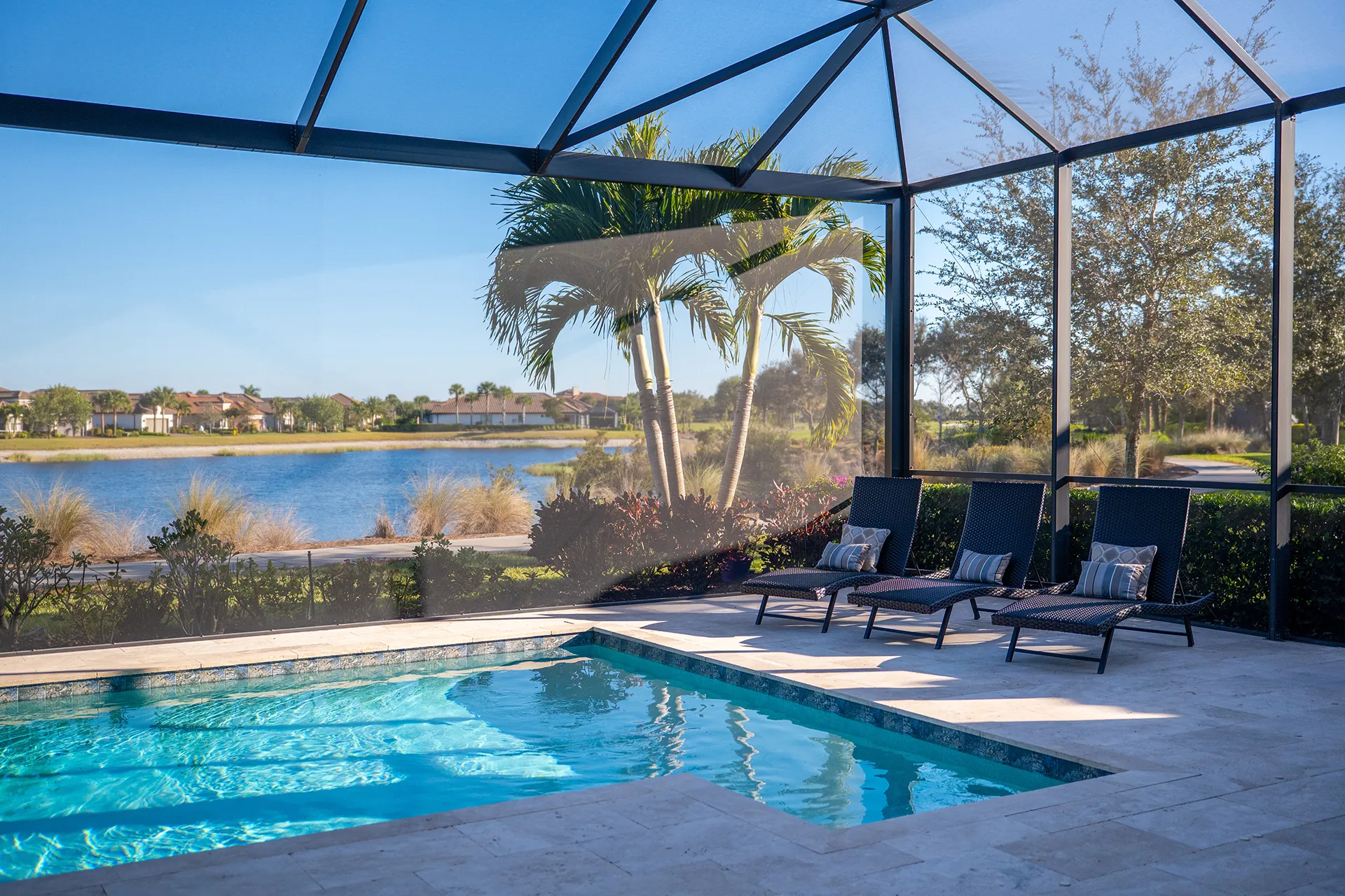 A Southwest Florida pool home with a lake view