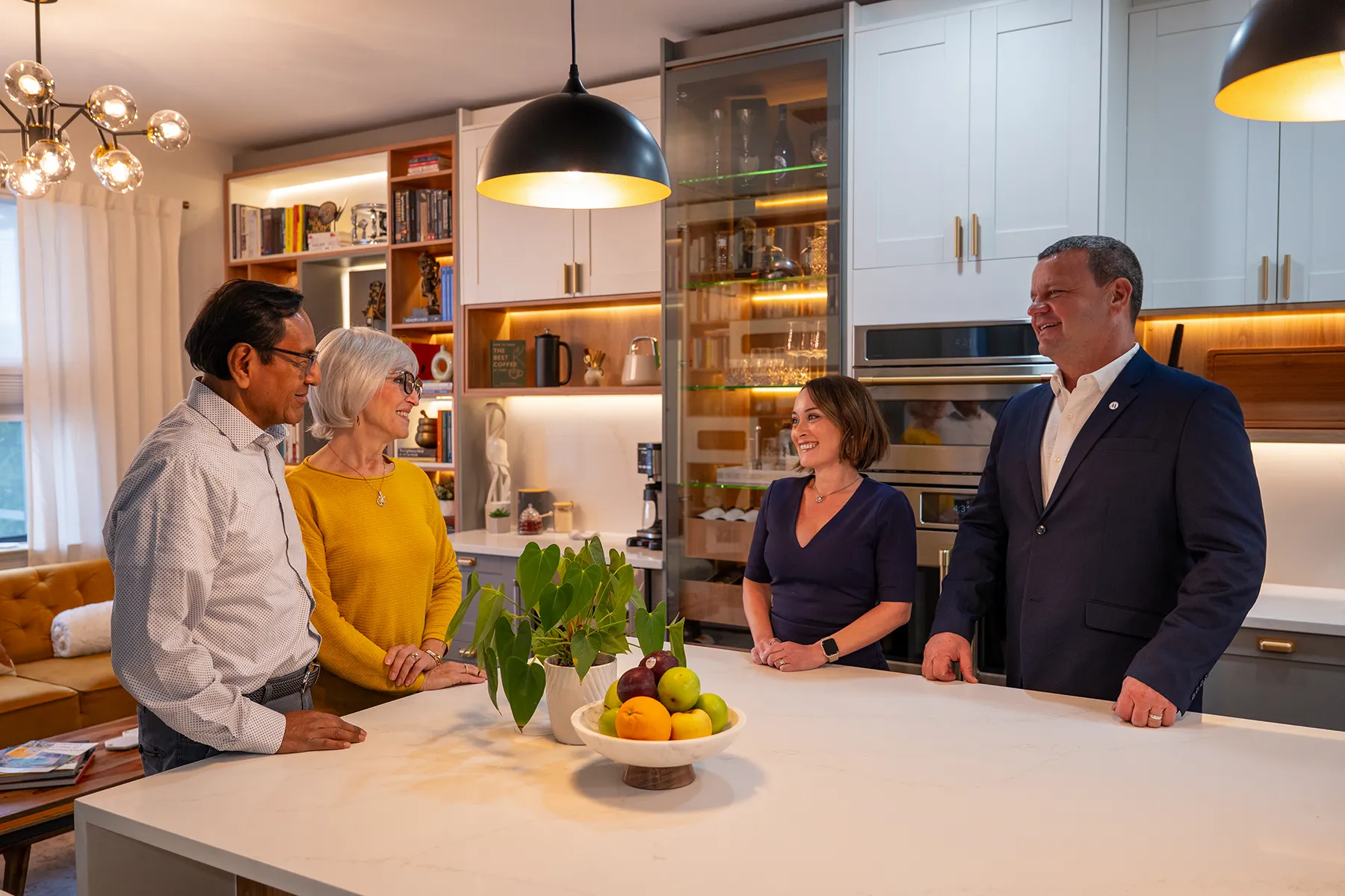 Worthington Realty team meeting with home buyers in a Southwest Florida kitchen