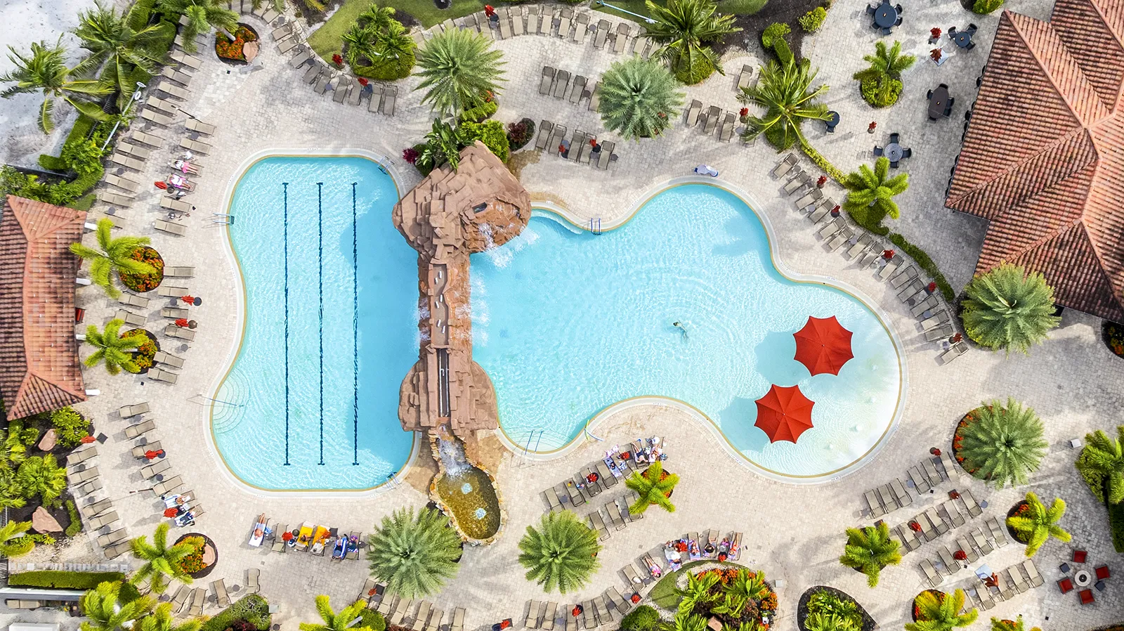 Resort pool and clubhouse at Bonita National Golf and Country Club in Bonita Springs Florida, featured on recent home sales page