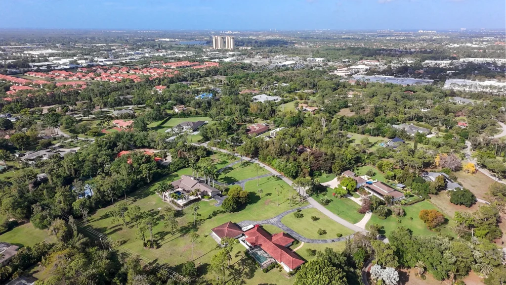 Aerial view of Pinehurst Estates, Brynwood, and established neighborhoods along Daniels Parkway West in Fort Myers, Florida
