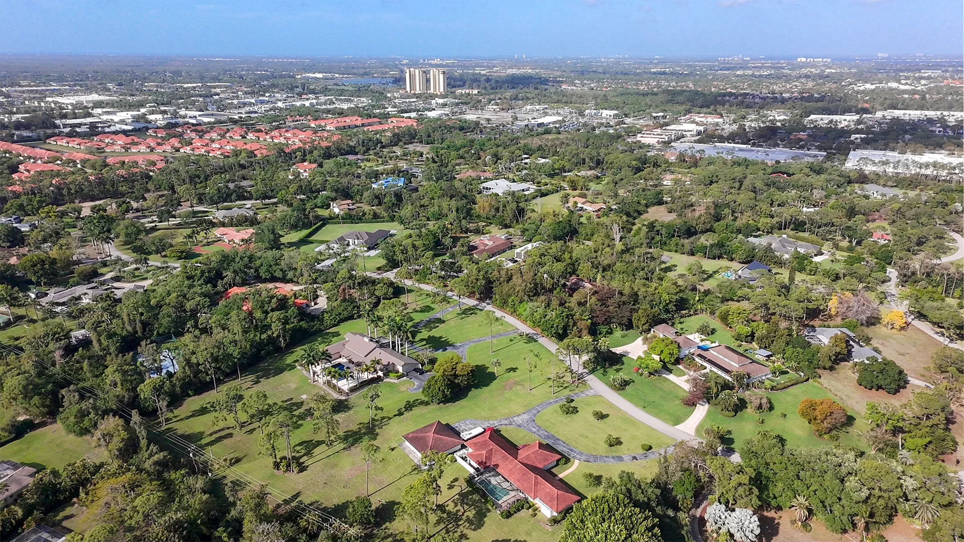 Aerial view of Pinehurst Estates, Brynwood, and established neighborhoods along Daniels Parkway West in Fort Myers, Florida
