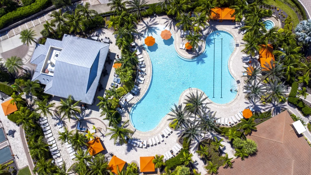 Aerial view of the resort-style pool at Esplanade Golf & Country Club in Naples, Florida