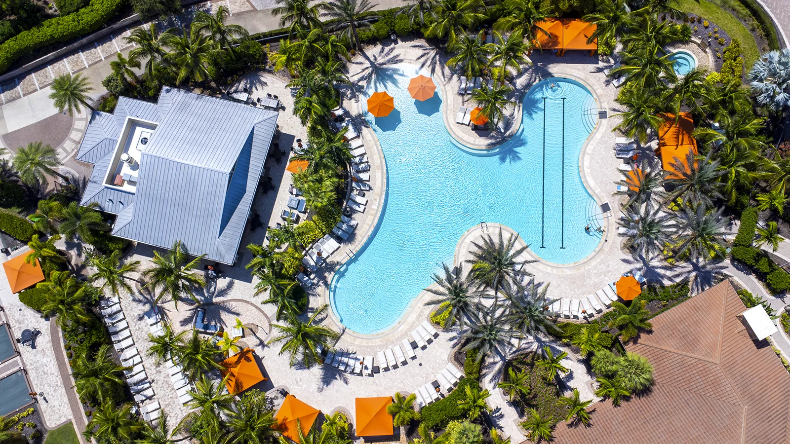 Aerial view of the resort-style pool at Esplanade Golf & Country Club in Naples, Florida