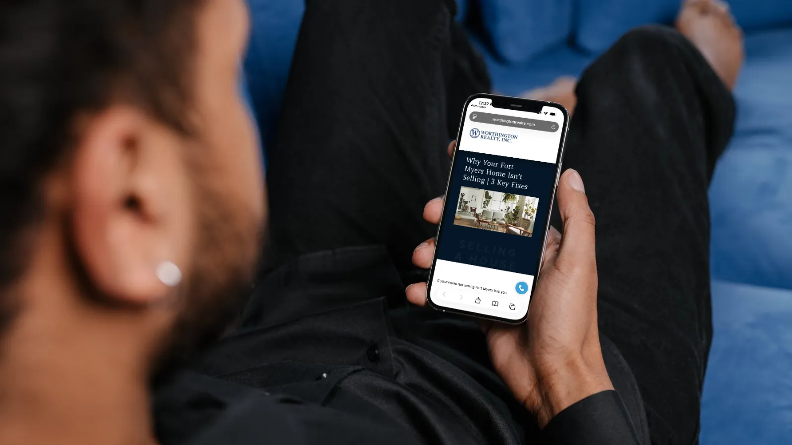 Homeowner in Fort Myers reading why homes get relisted on a phone