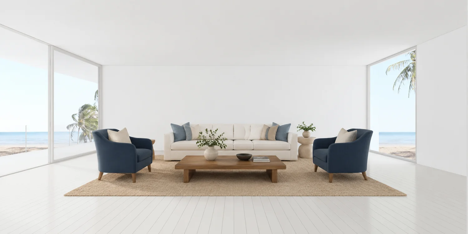 The same living room virtually staged with a sofa, two navy chairs, and a coffee table